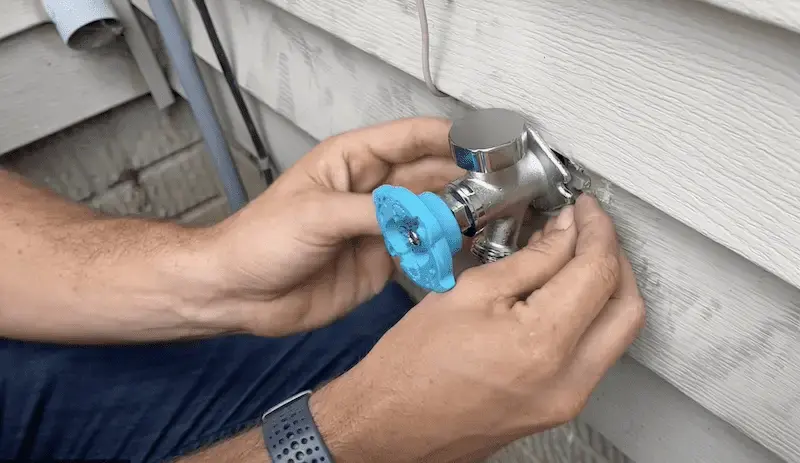 Installing new outdoor faucet with tape